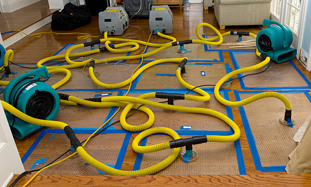 Professional Flood Damage Restoration technician working in Reynoldsburg, OH